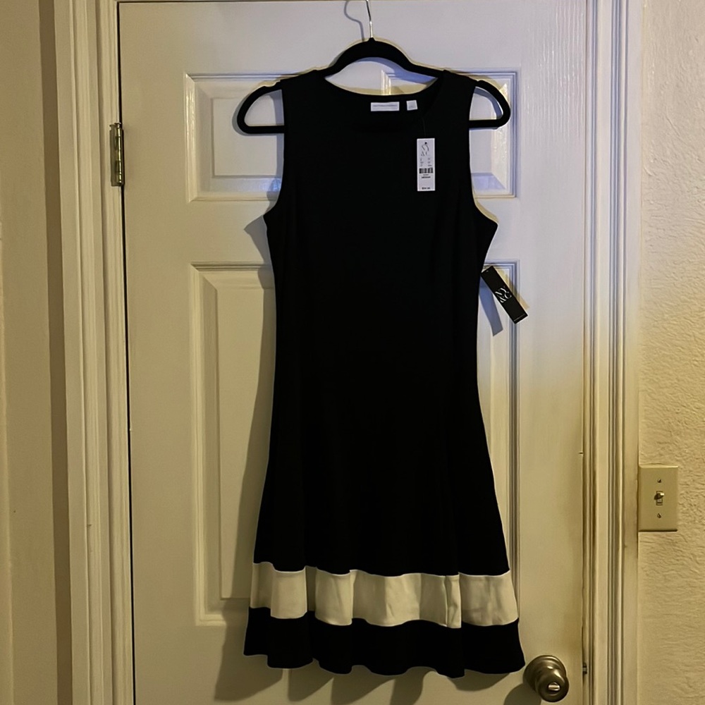 New York & Company little black dress, hits above the knee. 35” inches long.